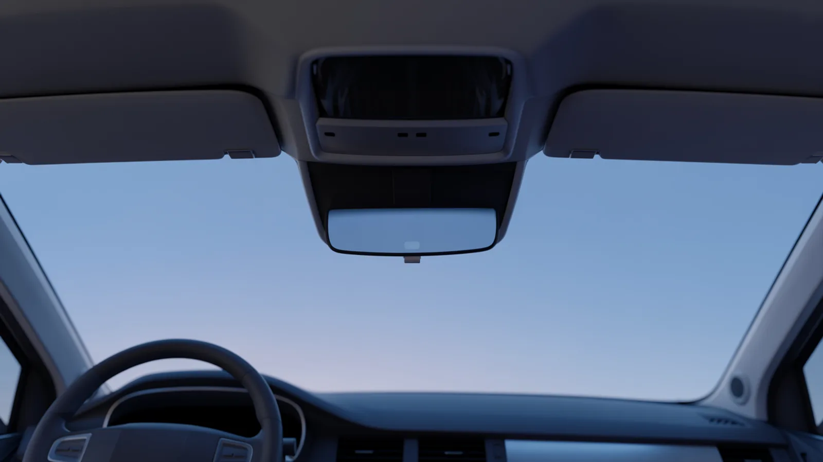 Forward-facing ADAS camera module at the top of a windshield